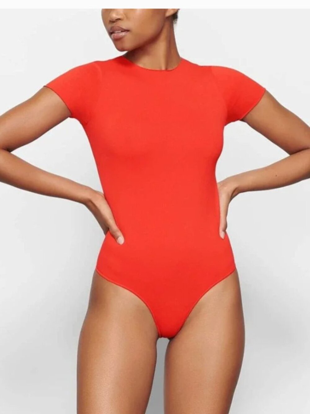 SKIMS ESSENTIAL T-SHIRT BODYSUIT in Fire Orange S/M